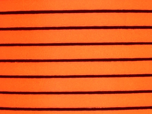 Rzemień naturalny płaski 5x1,8mm pomarańczowy neon [20cm]